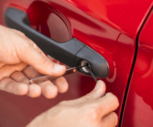 locksmith picking a automobile car door lock